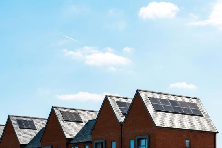 Solar panels on houses on a sunny day in England