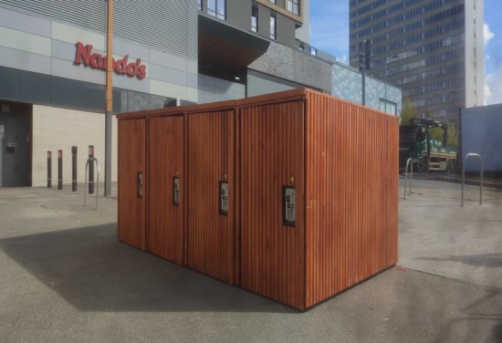 Wooden cycle lockers in a town centre