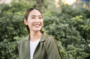 Young professional wearing a green blazer