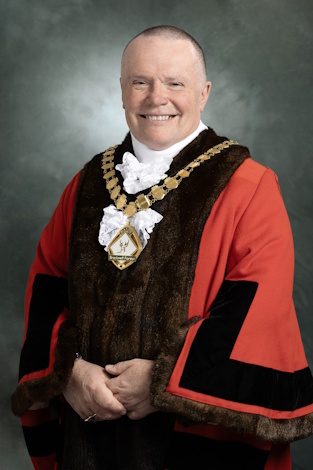 The Mayor of Bracknell Forest, Peter Frewer, wearing his ceremonial robes and chain.