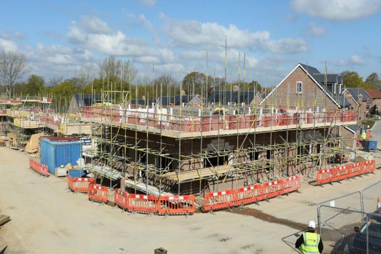 Building site with house half constructed 