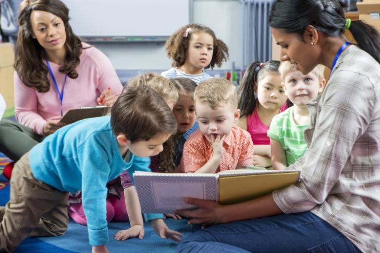 children listening to a storyteller