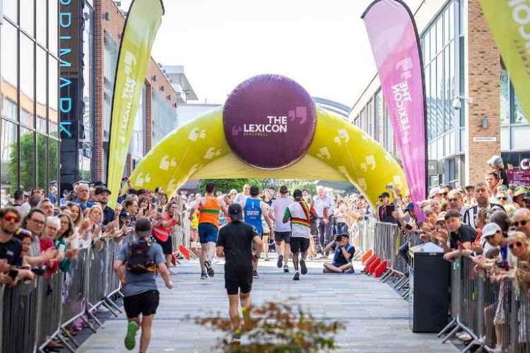 runners crossing the finish line