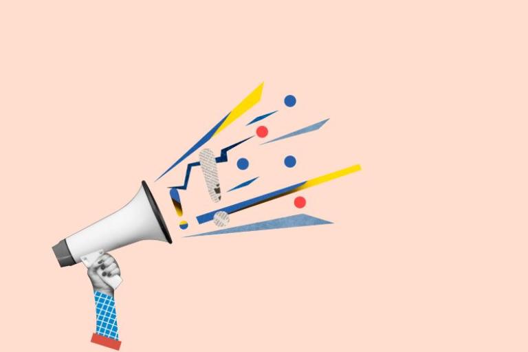 a megaphone with lines and circles coming off it