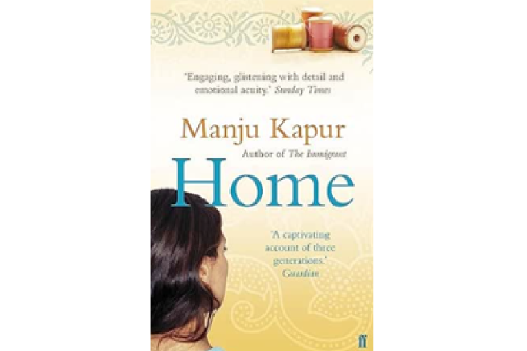 Book cover titled “Home” by Manju Kapur with a woman seen from behind against a patterned background