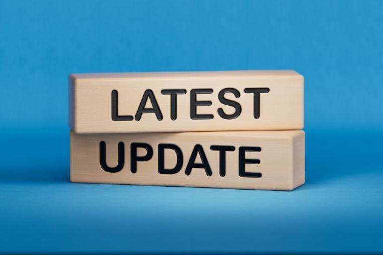 wooden blocks reading latest update