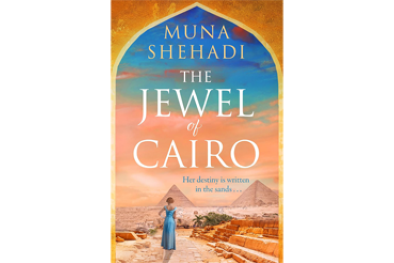Book cover showing woman in blue dress looking at the pyramids