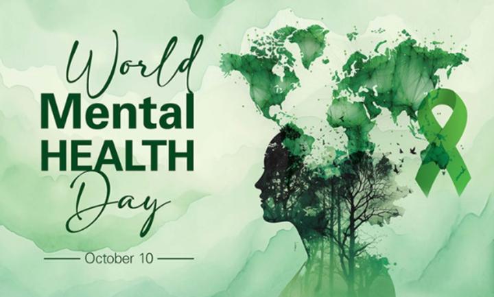 Green watercolour background with a silhouette of a head filled with trees and birds