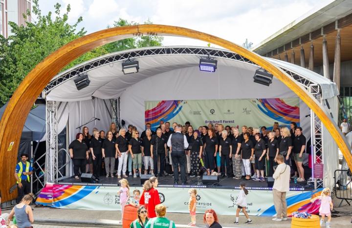 Choir sings on stage at the Bracknell Forest Communities Festival