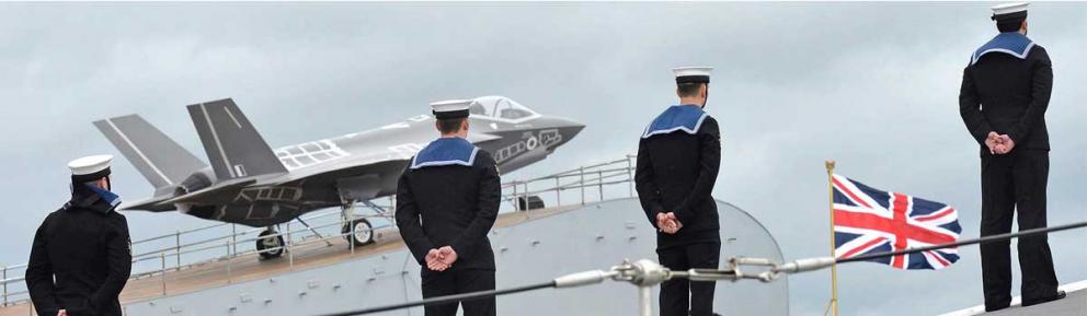 Sailors on ship flight deck