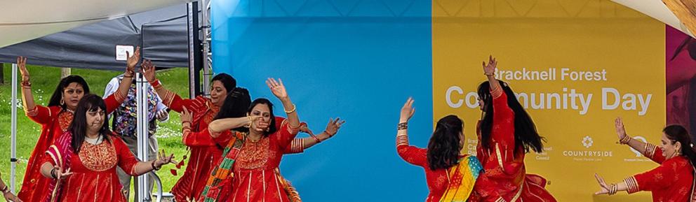 Dancing on stage in beautiful flowing red dresses
