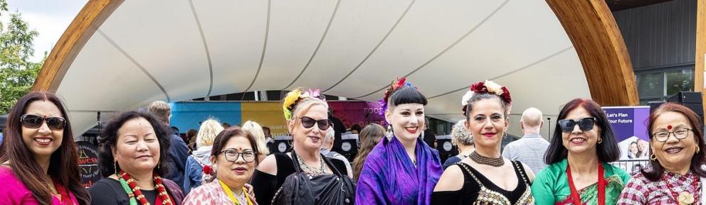 Diverse group of people dressed in beautiful colours