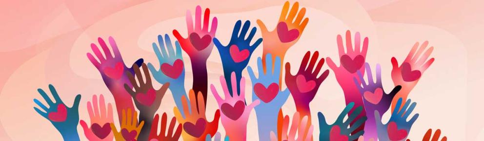 Raised colourful hands with hearts in palms