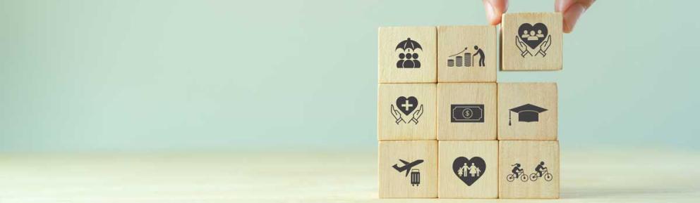 9 wooden blocks with staff benefits icons