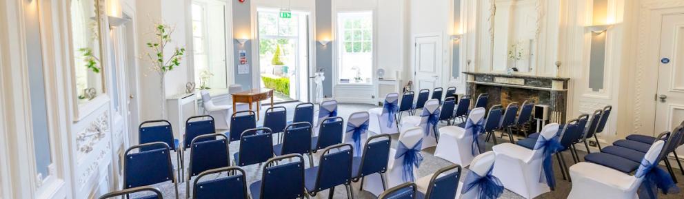 The Haversham Room at South Hill Park, decorated for a ceremony. 