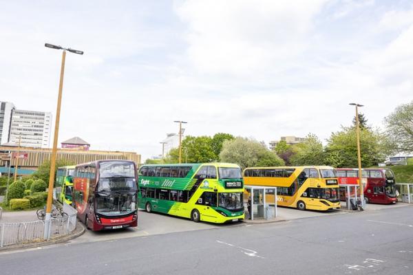 Four buses in parking spaces at Bracknell bus station
