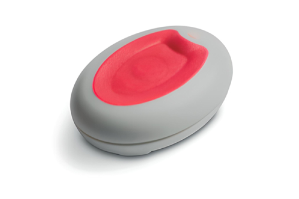 round grey object with red button