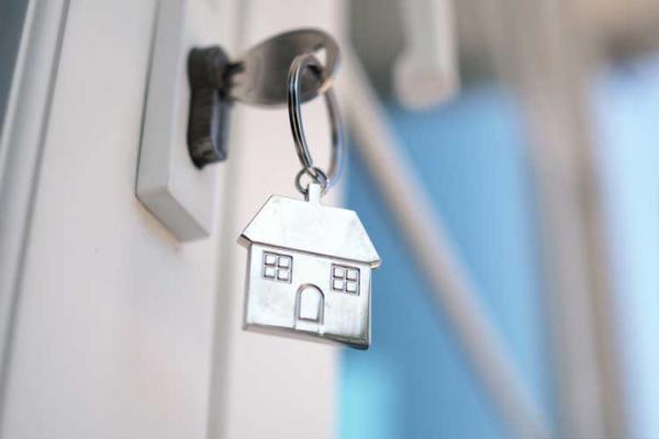 key in lock with a silver home keyring