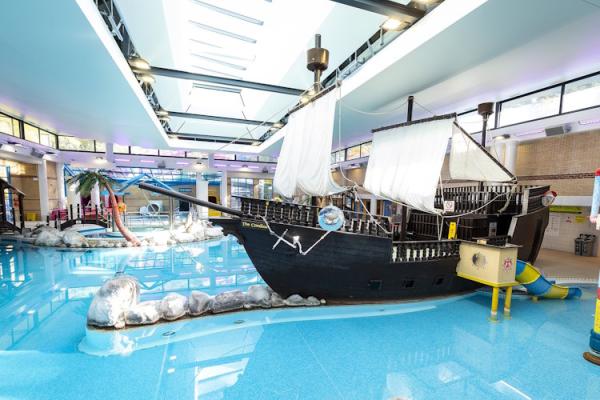 The Coral Reef splash pad, with a swimming pool and life-size pirate ship.