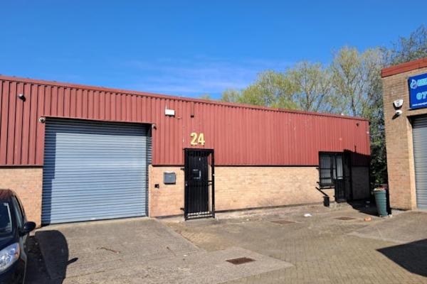 Front of industrial unit with number 24 above door